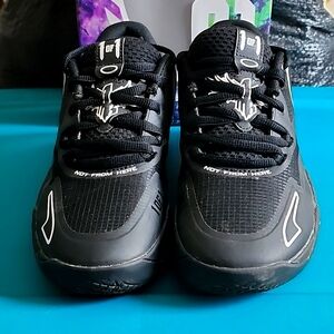 Boys size 6 M.E.L.O. mid sneakers